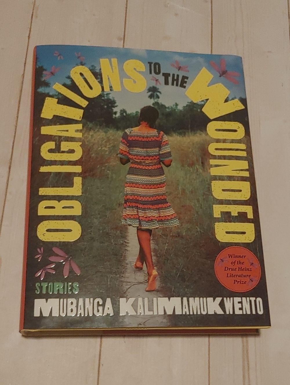 Obligations To The Wounded Adult Fiction Book By Mubanga Kslimamukwento